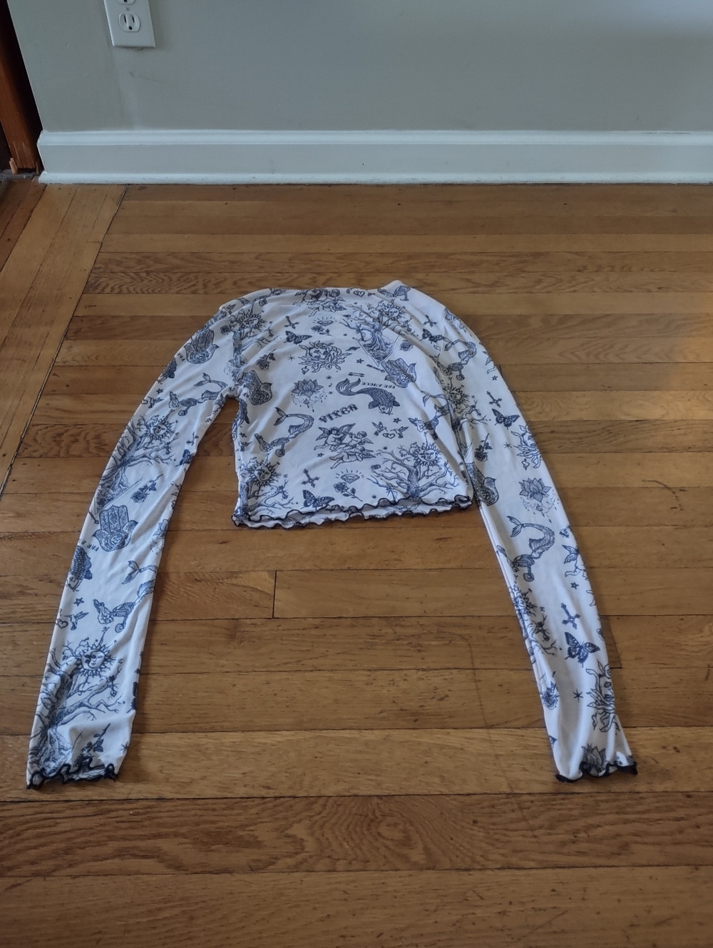 cream colored mesh semi sheer long sleeved patterned shirt from bear dance med